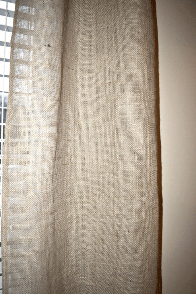 Determine the length of your DIY burlap curtains by measuring your windows