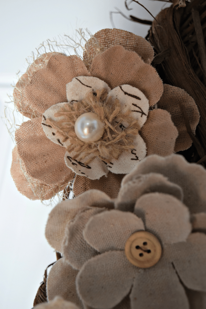 These rustic burlap flowers are beautiful with unique touches like pearls and buttons