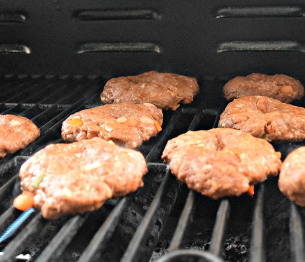 These grilled taco burgers are packed with delicious taco seasoning, onions, and tomatoes