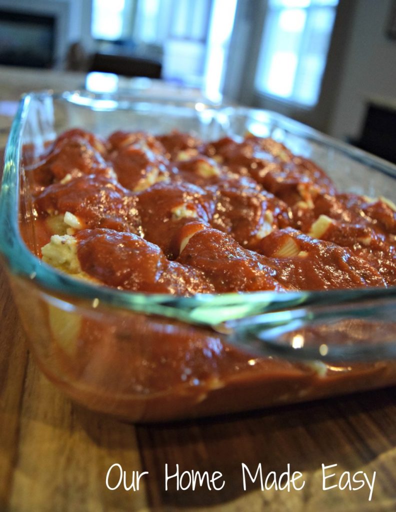 Cheesy stuffed shells topped with rich tomato sauce