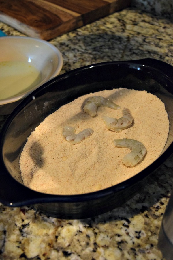 Fully coat the shrimp in the cracker breading