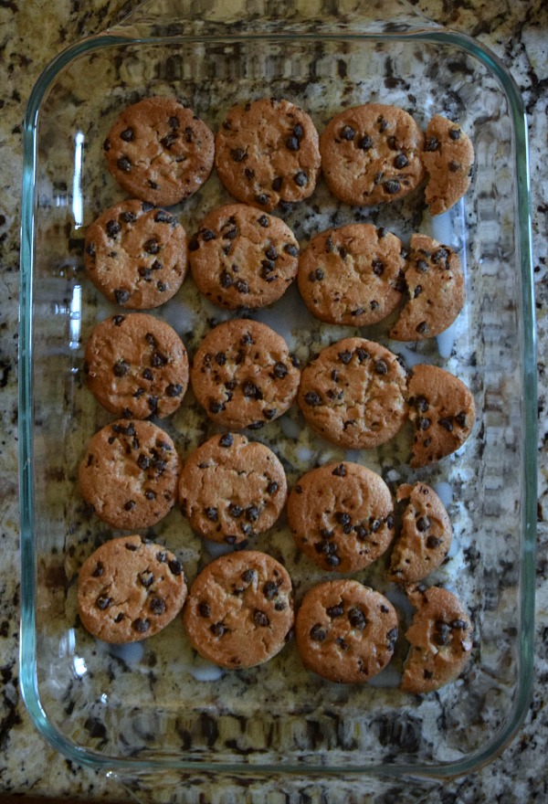 Start this no-bake cookie dough dessert by layering milk-dipped cookies