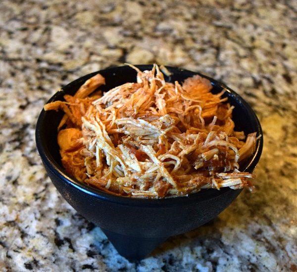 Chicken tacos with only TWO ingredients and your slow cooker. Perfect for week night dinners. Click to see the recipe!