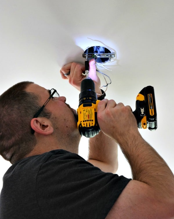 Install the hardware for the new ceiling light fixture