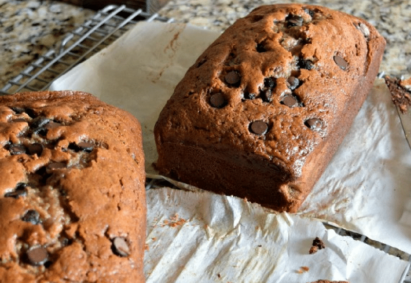 The perfect recipe for zucchini bread! Its has yummy chocolate and it is FULL of moisture and so easy to make. Click to see how it's made!