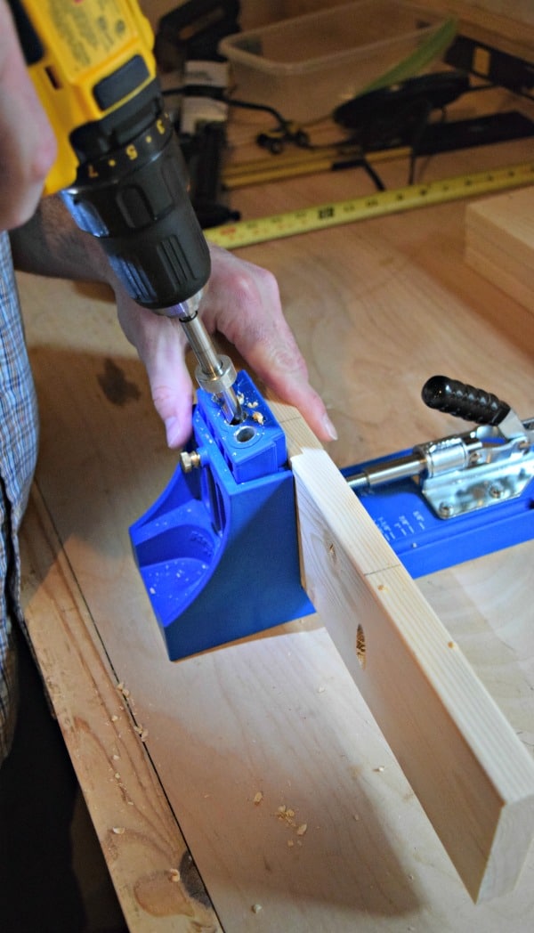 Use a guide to drill the pocket holes into the wood for your DIY wood tray