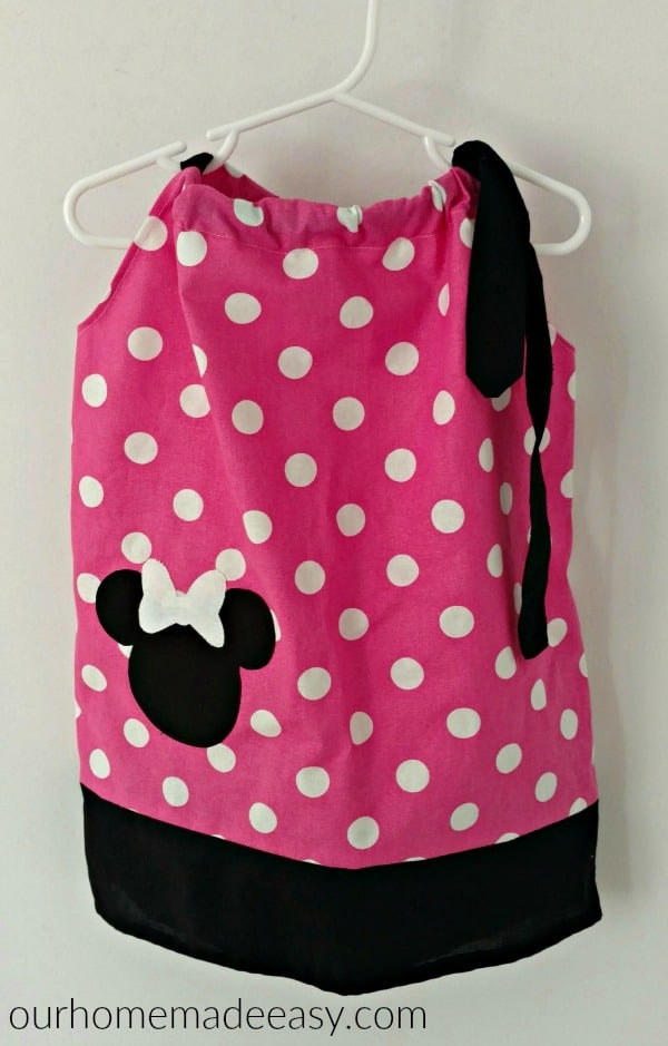 We made with DIY Minnie Mouse dress using a Minnie Mouse pillow case and it was perfect for Aubrey's Minnie Mouse Birthday Party 