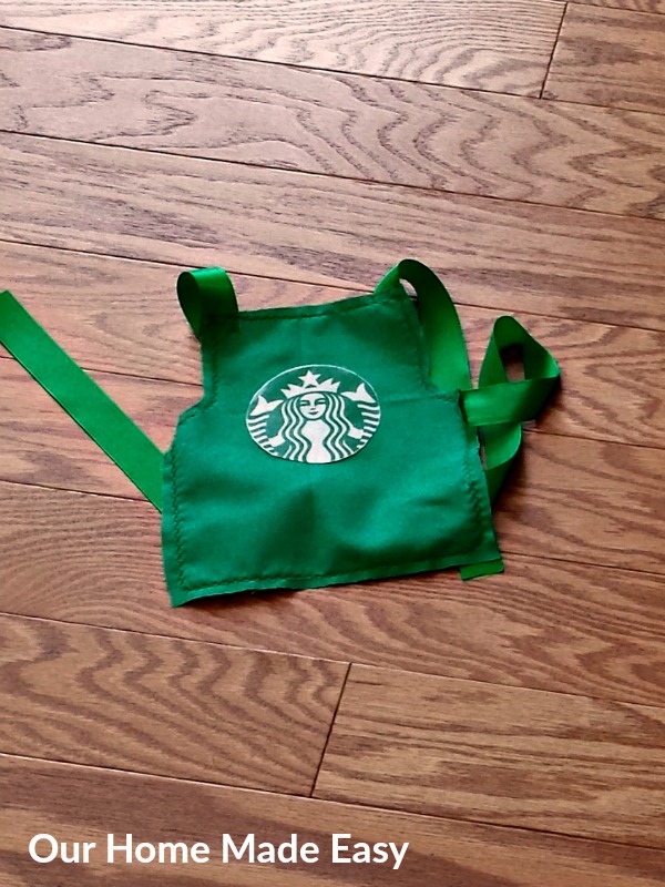 Make your own Starbucks Halloween Costume! This step by step tutorial includes picture sof the steps and materials needed for the project! Includes steps for making a coordinating Barista Apron for a sibling! Click to see how to make a your kid's coolest costume!