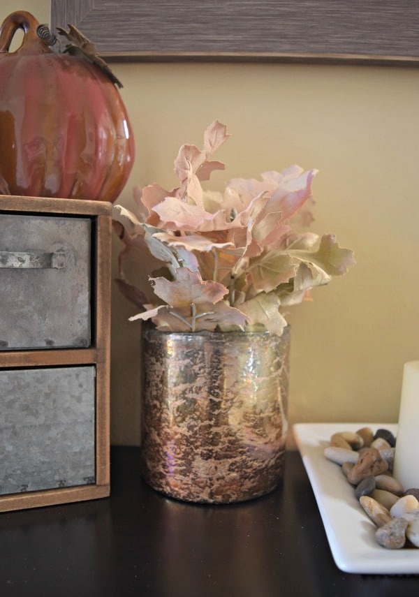I painted these faux fall leaves with an ivory spray paint to use as a fall arrangement