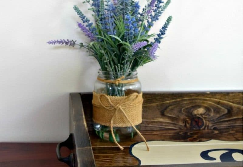 Make your own DIY Wood Tray for less than $10! It's super easy and reuires only a few materials! Click to see the step by step directions!
