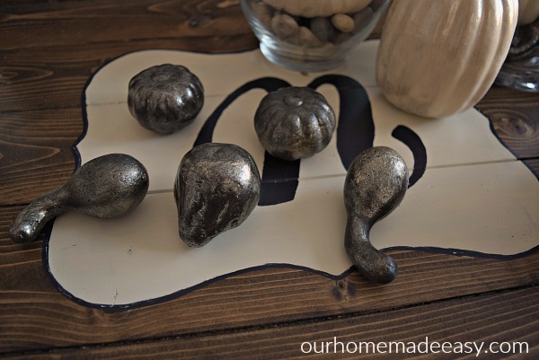I painted these dollar store pumpkins and gourds with a metallic silver spray paint