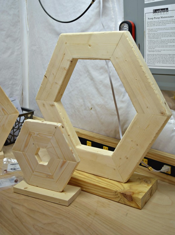 Attach the hexagon wooden pumpkins to the wooden base