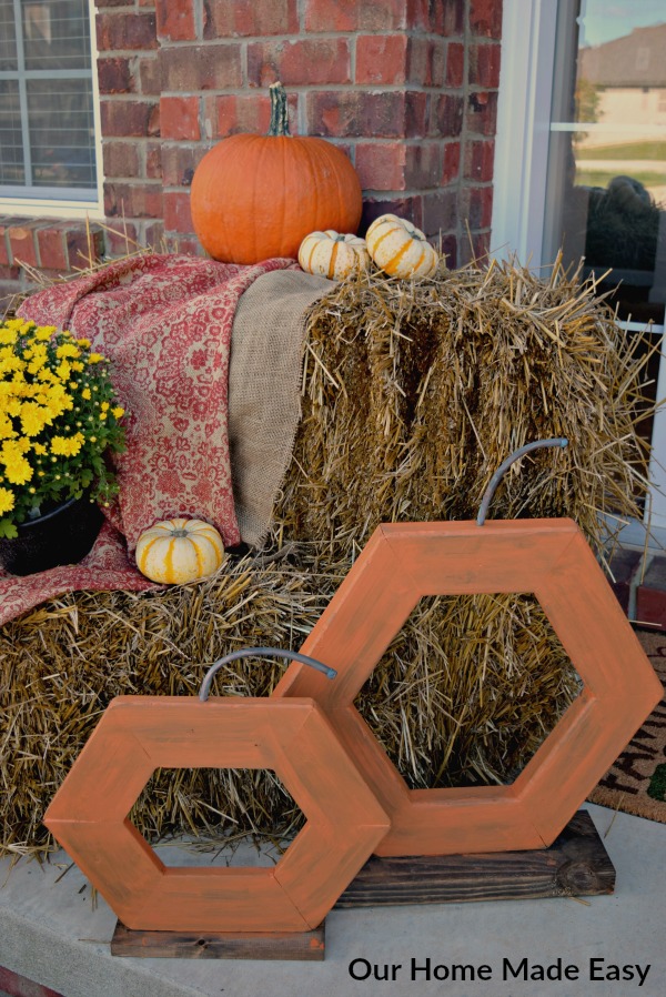 These DIY wood pumpkins were a simple afternoon project that looks great on our fall front porch