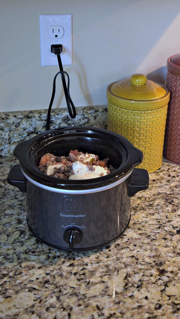 Toss all three ingredients into the crockpot and set on high for a few hours for a delicious and easy queso dip