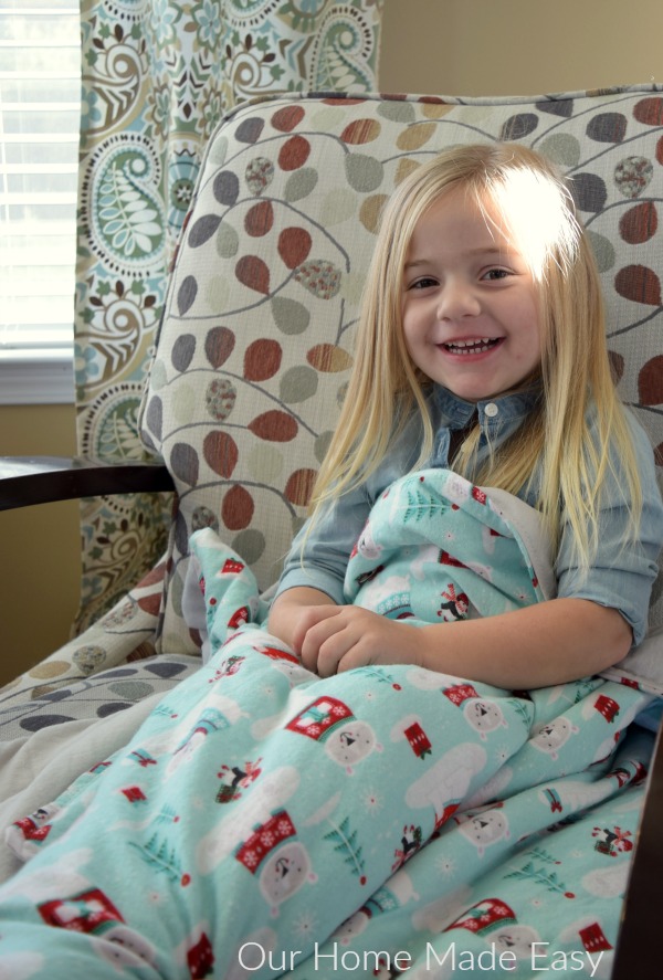 A warm flannel blanket made with Christmas themed fabric