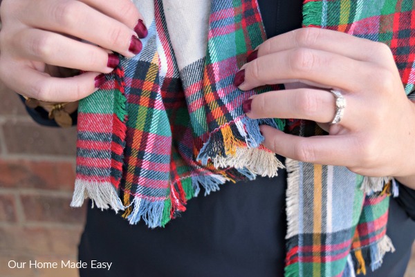 An easy how-to in making your own $5 flannel blanket scarf! Click to see how easy it is to make!