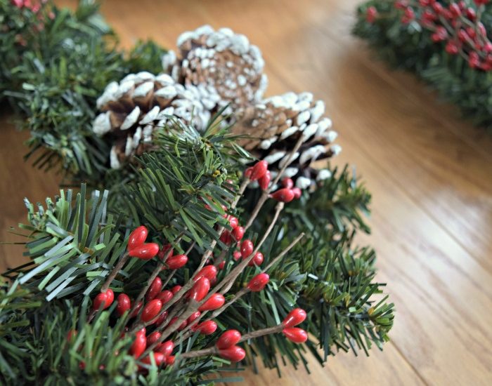 Make this super easy and budget friendly Christmas Wreath! It's only a few dollars. Click to see the steps.