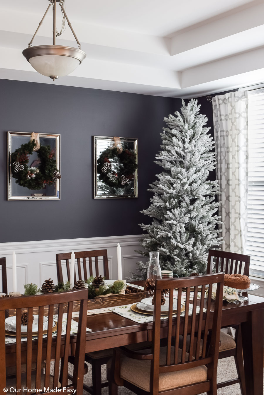 Our bright Christmas dining room has simple Christmas decor that brightens up the room