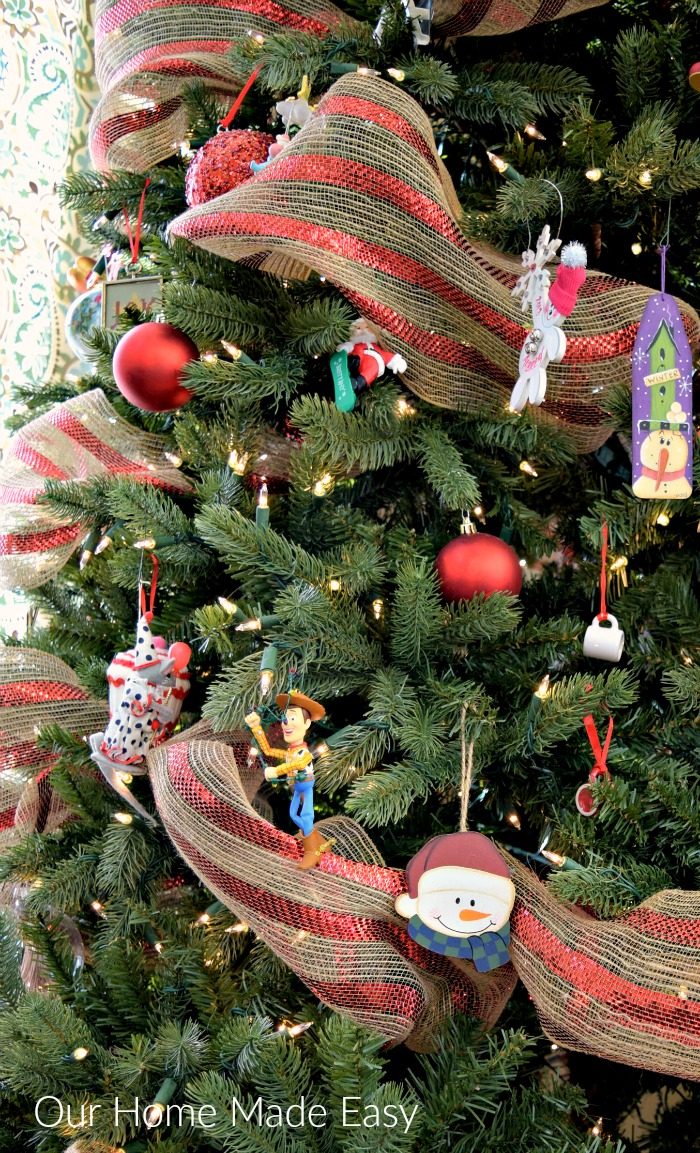 The kids were excited to help out with decorating the Christmas tree with their favorite ornaments.