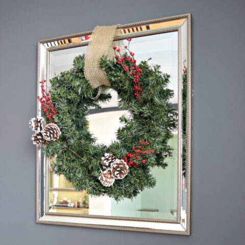 Make this super easy and budget friendly Christmas Wreath! It's only a few dollars. Click to see the steps.