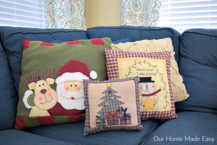 These Christmas throw pillows are family favorites that add a cozy Christmas touch to our home every year