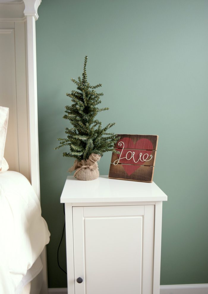 A simple green Christmas Bedroom decor from a busy mama. Click to see the room!