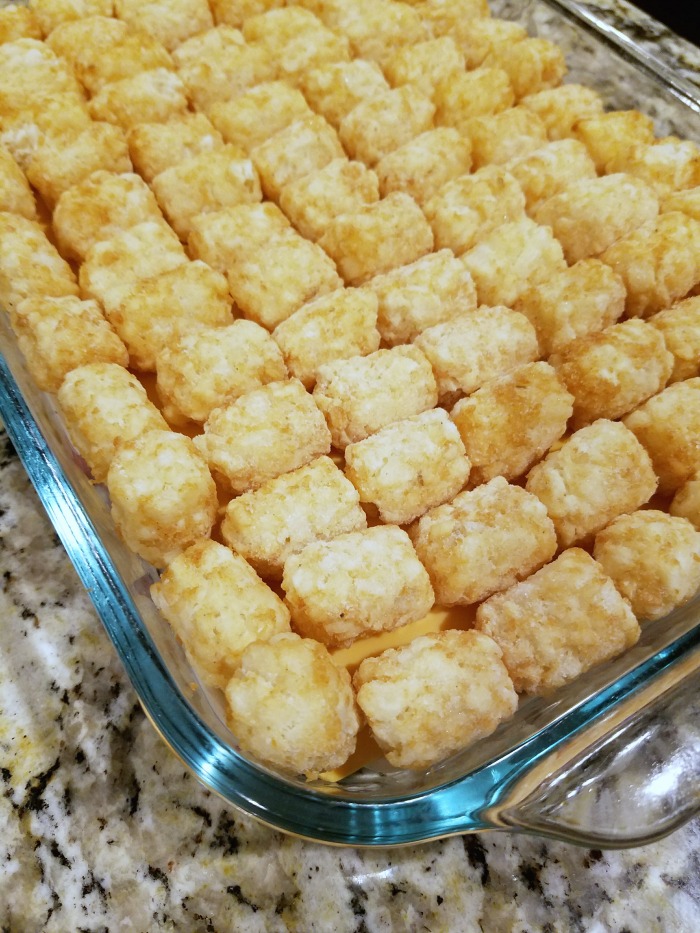 I love lining up the frozen tater tots in neat little rows--it just makes this easy tater tot casserole look so delicious and pretty!