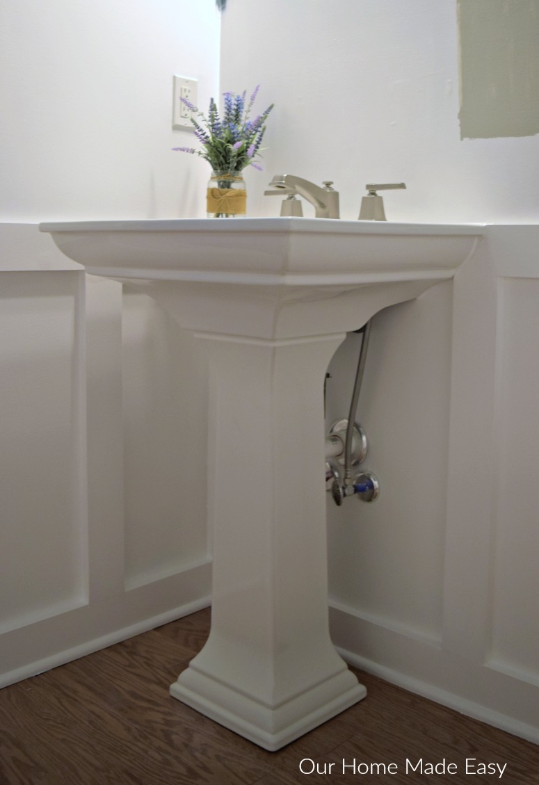 Here's how we installed a new pedestal sink in our powder room makover