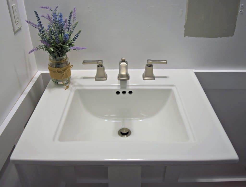 Our new pedestal sink installation was a simple project that we decided to DIY