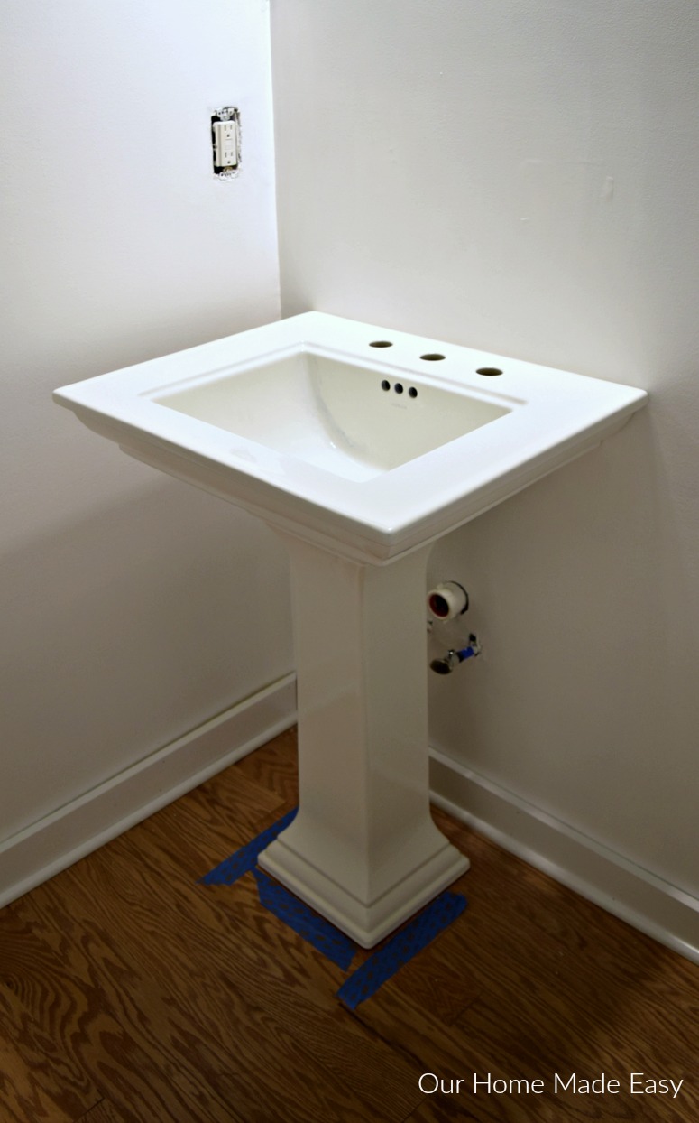 The installation of our new pedestal sink was so easy, we decided to DIY it!
