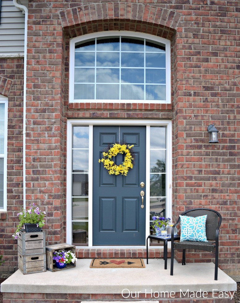 This small front porch is all decorated and ready for our summer visitors