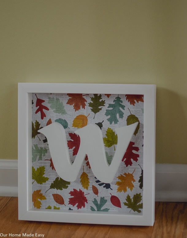 This cute DIY shadowbox is perfect for fall and you can change out the paper for every season! You can love it all year long. Click to see the steps!