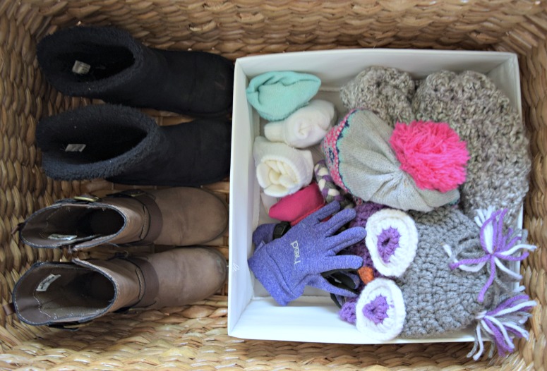 Add a shoe box inside a basket for extra separated storage for things like gloves and hats in the wintertime