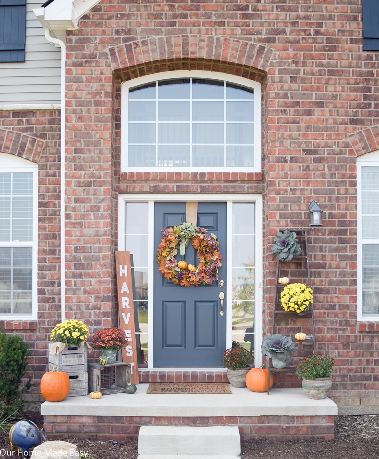 This easy rustic fall front porch is a great way to welcome guest to your home