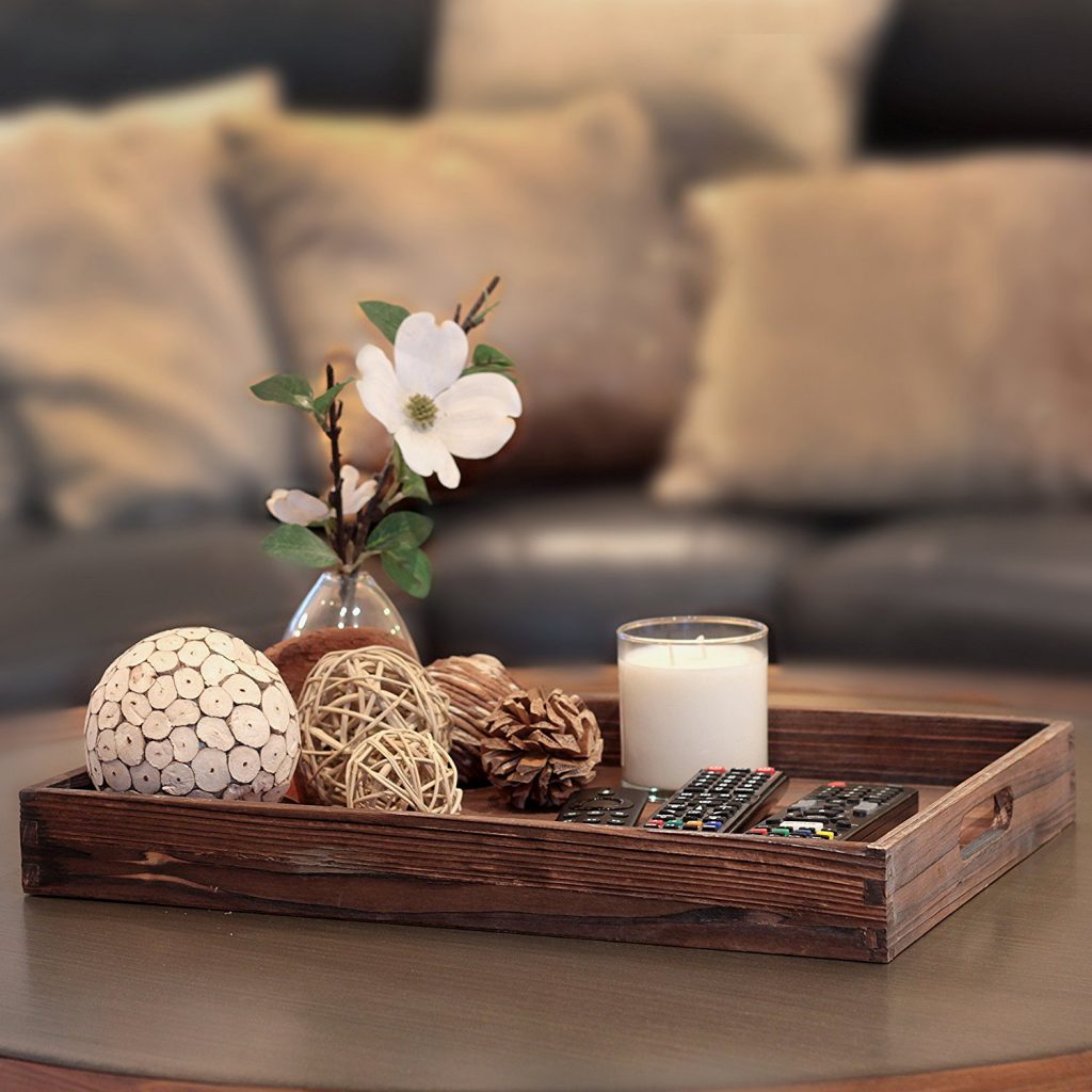 This wooden centerpiece tray is a great farmhouse style accent piece for your home