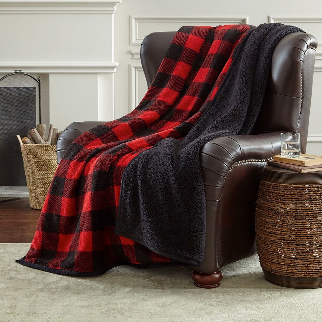 This cozy fleece and plaid throw blanket will have your secret Santa feeling warm and cozy all winter long