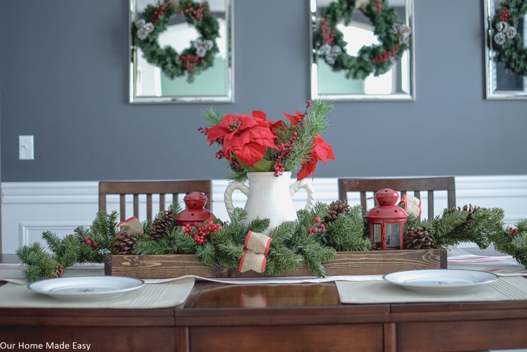 This DIY wood serving tray makes a perfect centerpiece for our Christmas table