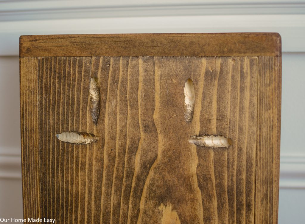 Pocket holes drilled into the wooden board for easy assembly