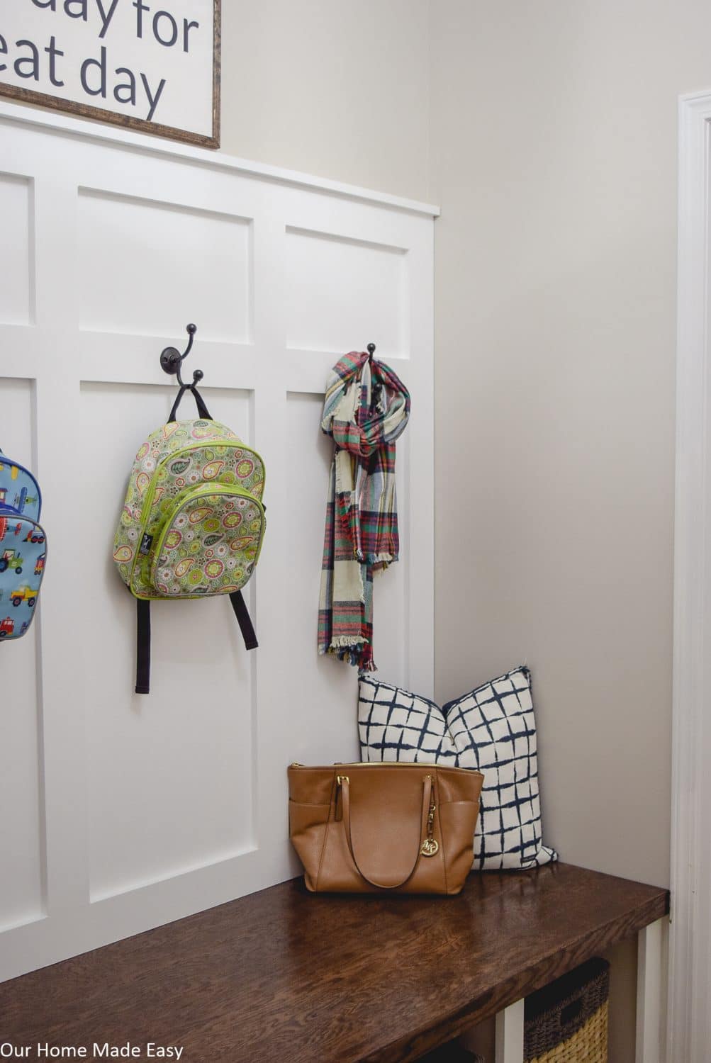 The color scheme in our mudroom and entry way is light beige, to keep the room feeling open and bright