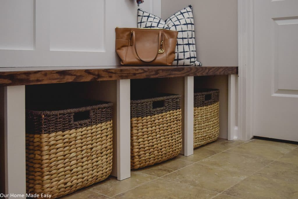 Toss the catch-all clutter into baskets for more efficient storage in a small space