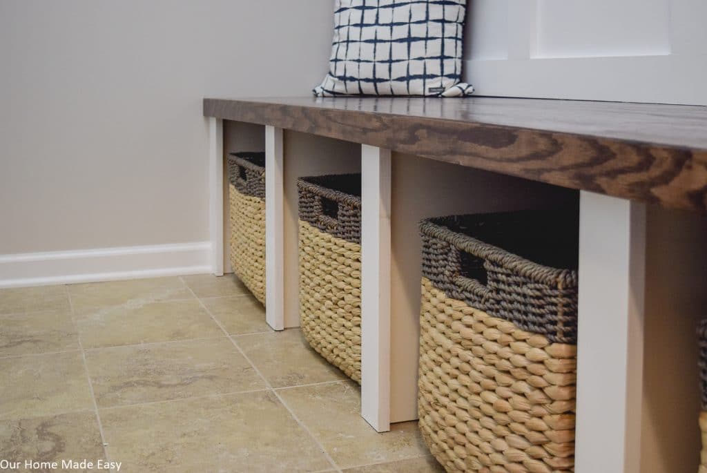 A sit down area in a small space doubles as storage AND a place to slow down and clean up!