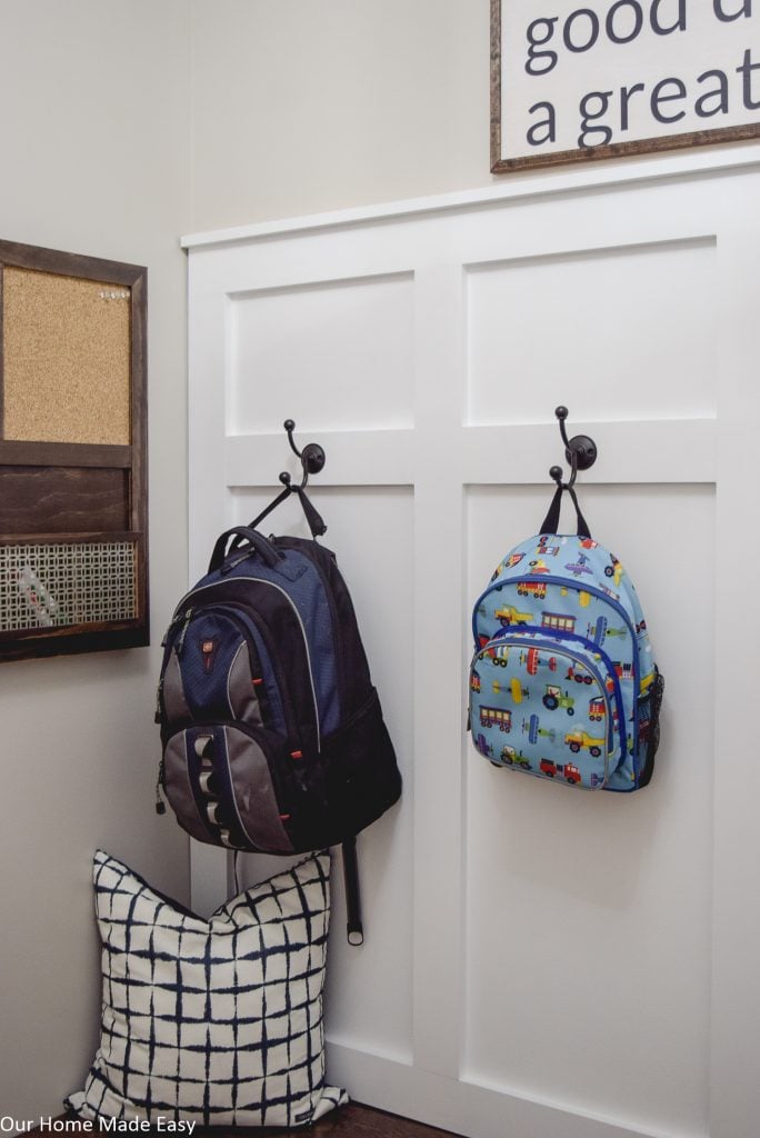 Keep backpacks off the floor with large hooks