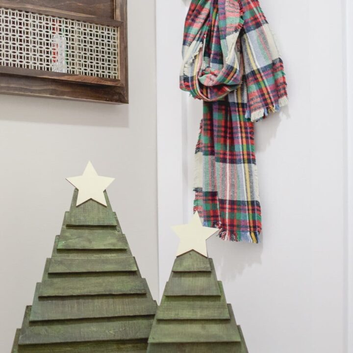 Make your own pallet Christmas trees quickly! You can paint them any color and add some fun decor! Click to see how to make them for yourself!