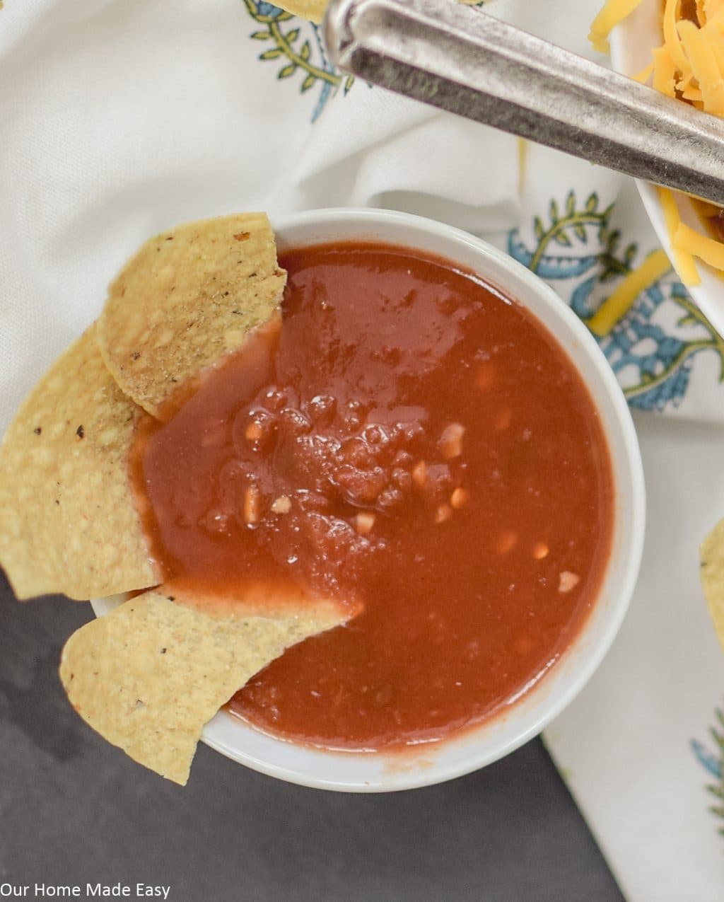 Chips and salsa is the perfect side to serve with this slow cooker tortilla soup recipe