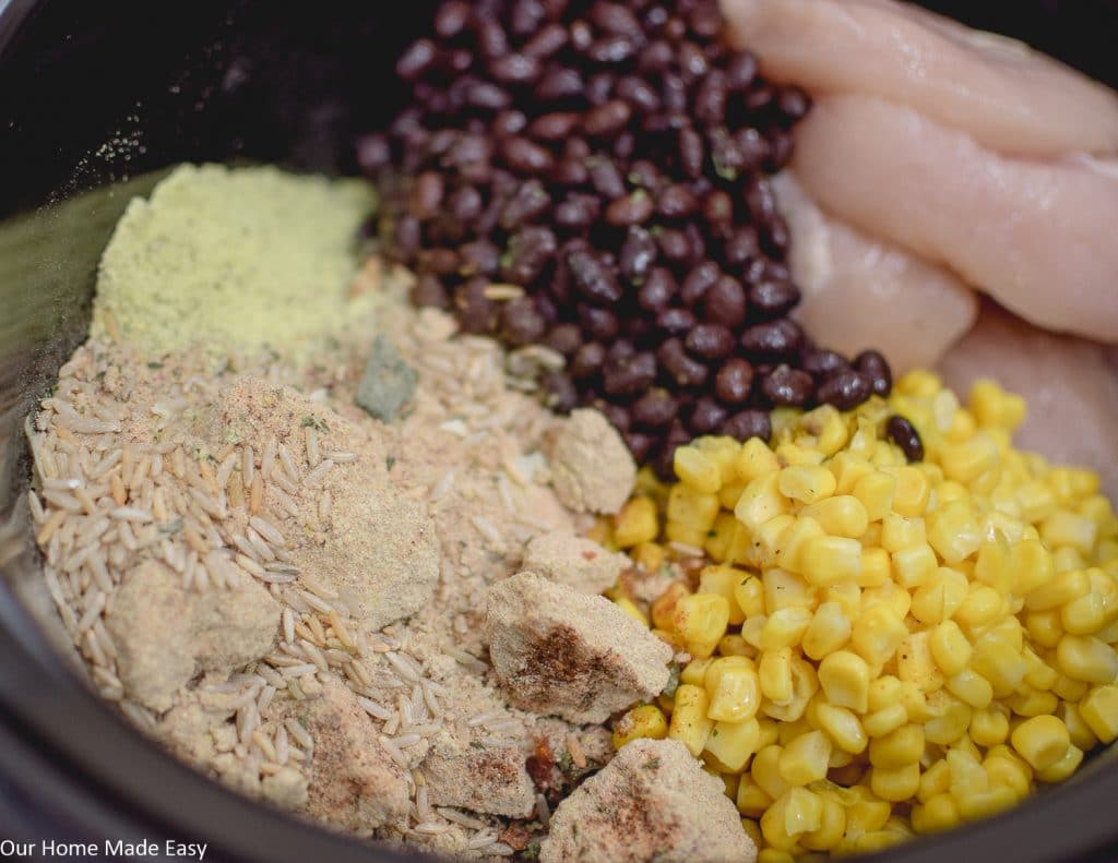 Southwest style chicken ingredients mixed together in a bowl