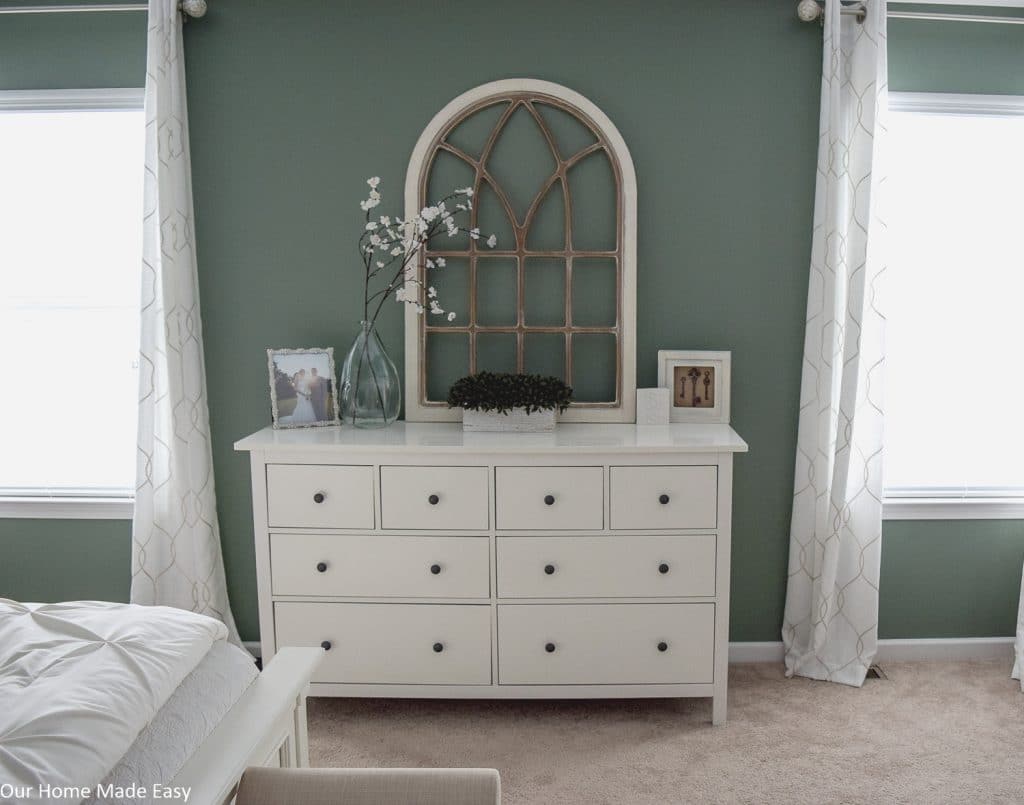 Our master bedroom color scheme is a lovely, warm winter green that really brightens up the space