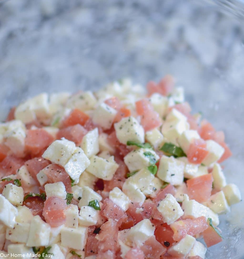 This Caprese Bruschetta recipe has juicy diced tomatoes and creamy mozzarella cheese