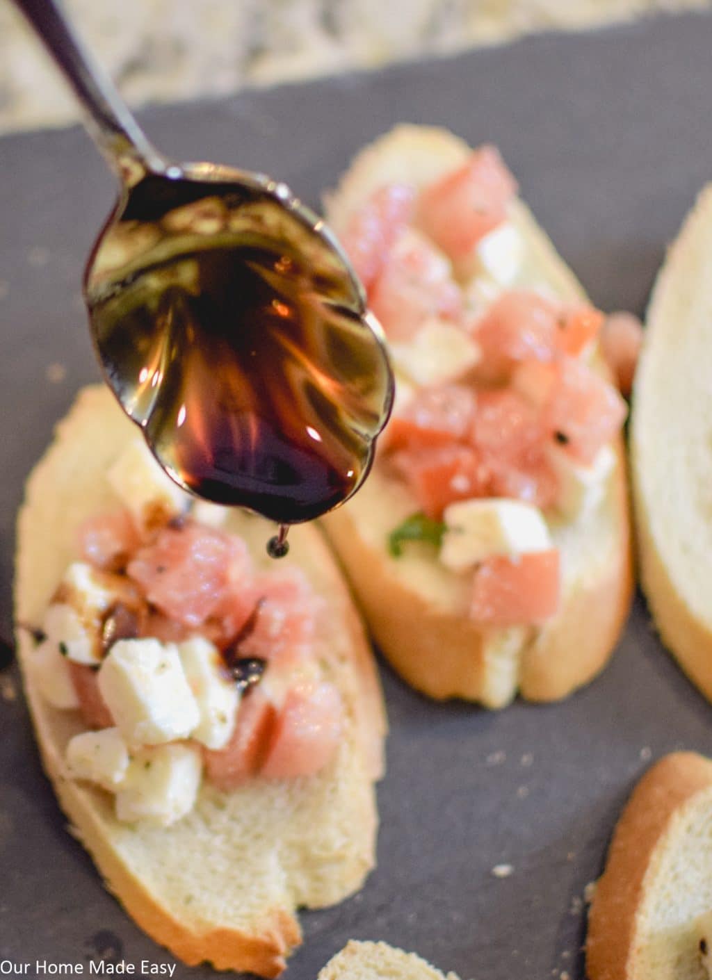 These Caprese Bruschetta bites are drizzled with balsamic dressing