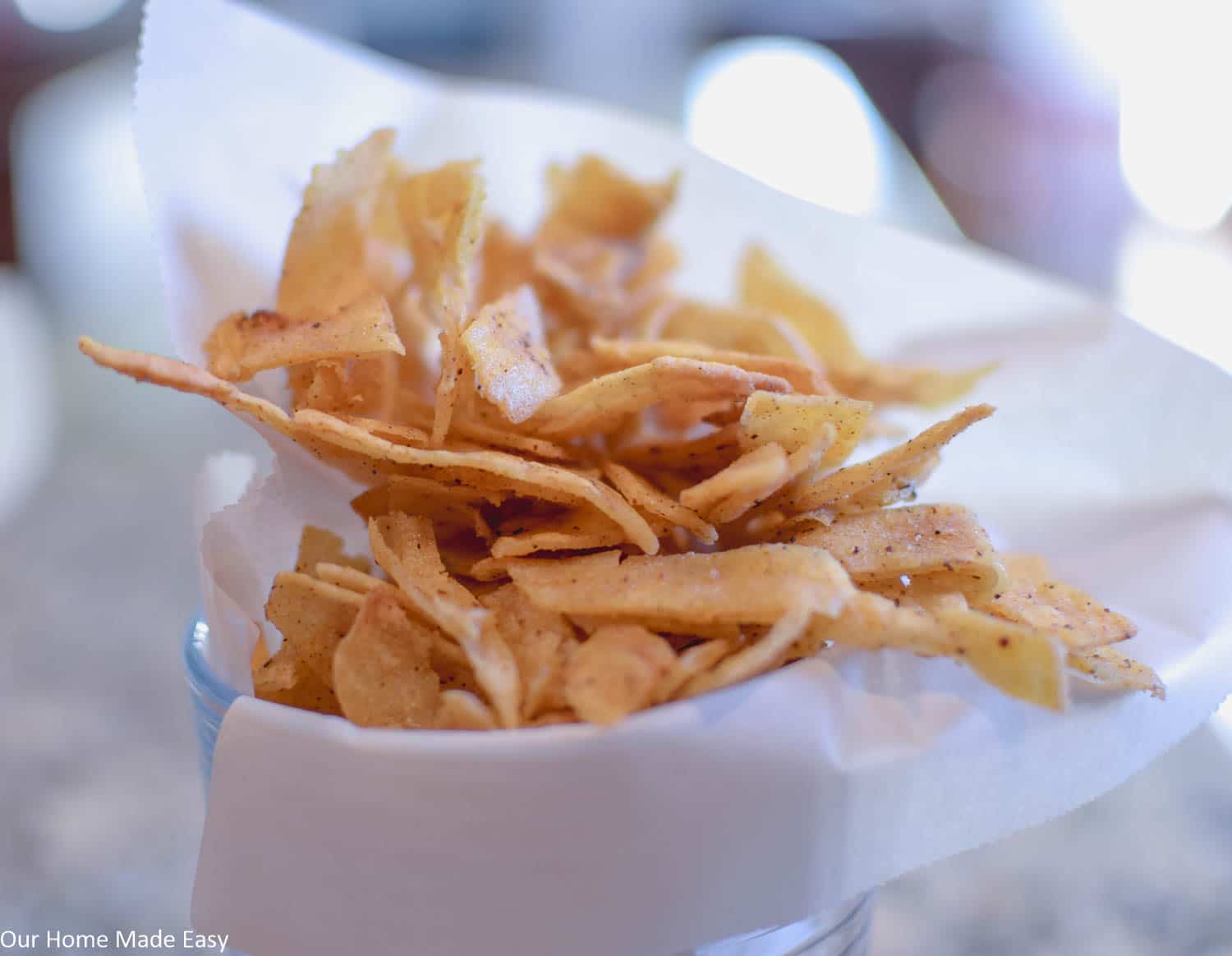 These crispy and flavorful homemade tortilla chips are so easy to make, they're perfect for any party