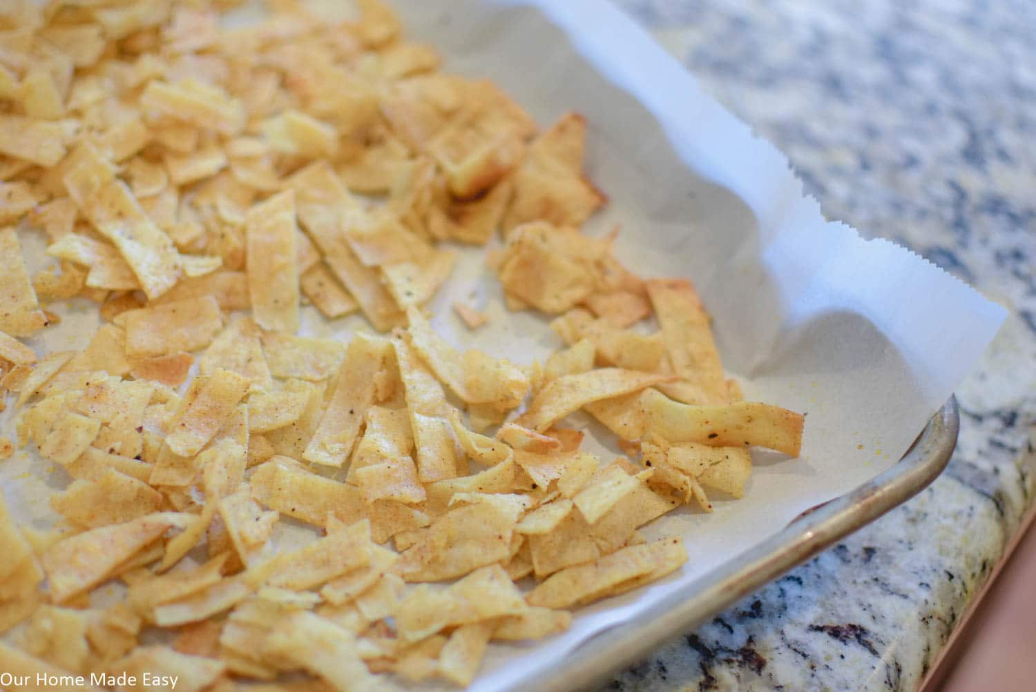 These homemade tortilla strips are perfect to add a little crunch to any kind of salad!